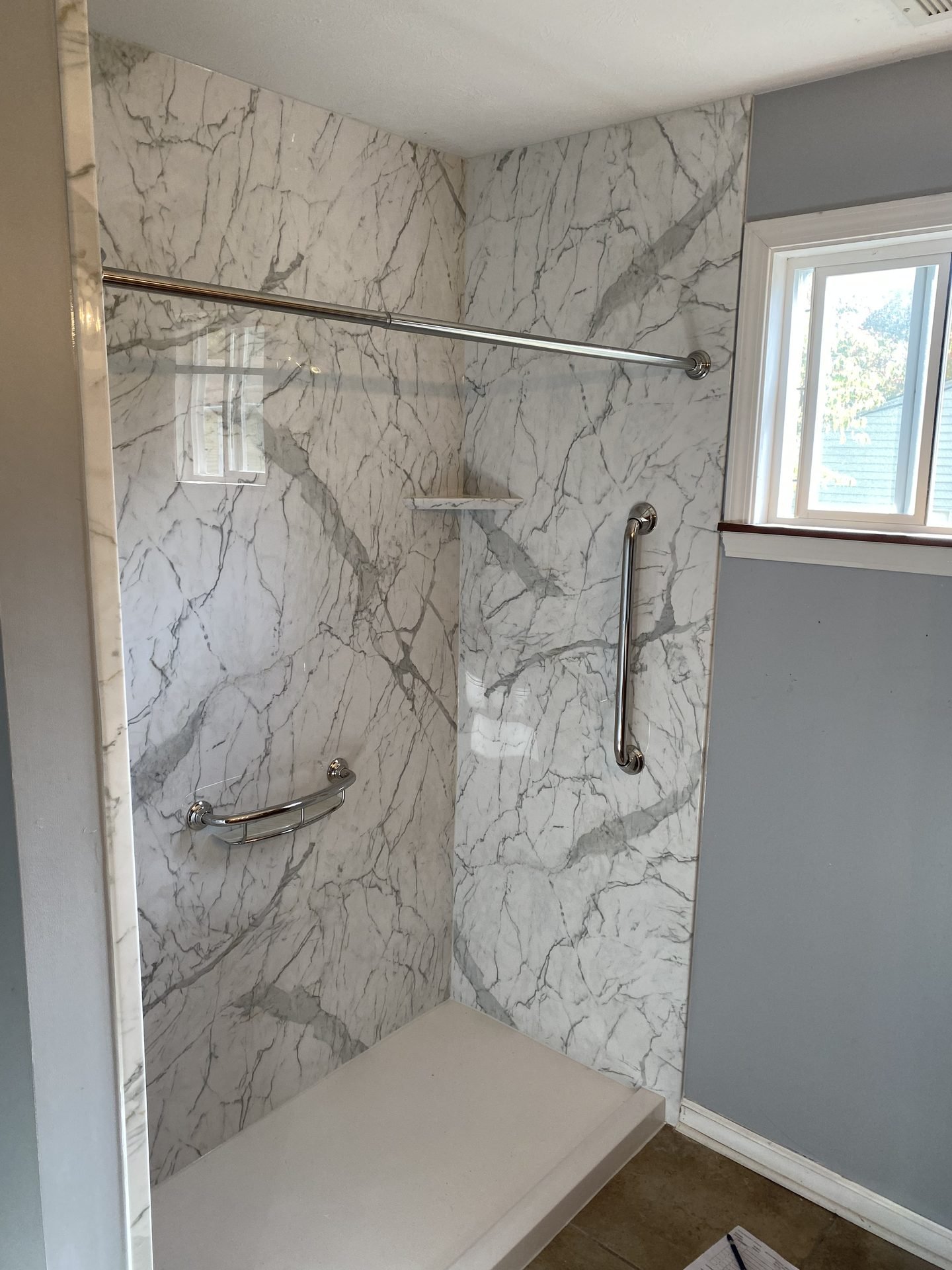 Bright tiled shower remodel
